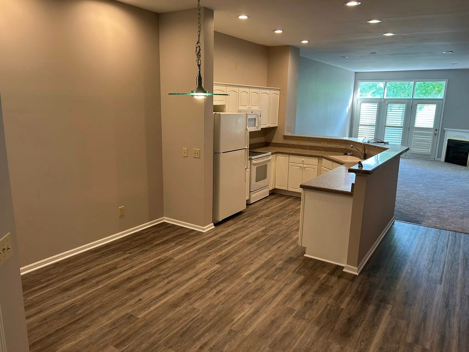 Custom kitchen with hardwood flooring